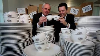 Senators John Madigan and Nick Xenophon with the plates, cups, bowls and saucers they had made especially for Parliament House in Canberra to replace those made in the UAE. Courtesy heraldsun.com.au
