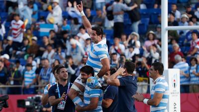 Argentina's flanker Juan Manuel Leguizamon (top) gestures as he is carried by teammates after the Japan 2019 Rugby World Cup Pool C match between Argentina and the United States at the Kumagaya Rugby Stadium in Kumagaya. AFP
