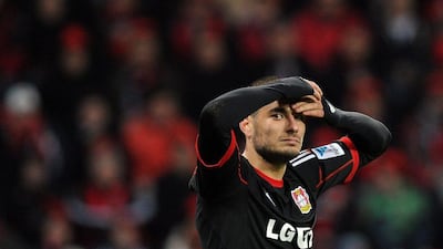 Bayer Leverkusen's Eren Derdiyok reacts after losing to Eintracht Frankfurt on Sunday. Leverkusen, second in the Bundesliga, fell seven points off leaders Bayern Munich's title pace. Marius Becker / EPA