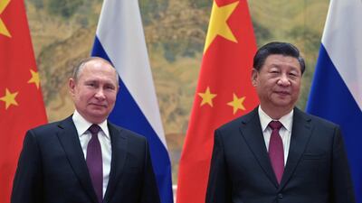 Russian President Vladimir Putin (L) and Chinese President Xi Jinping (R) pose for a picture during their meeting in Beijing, China, February 4, 2022. EPA / Sputnik