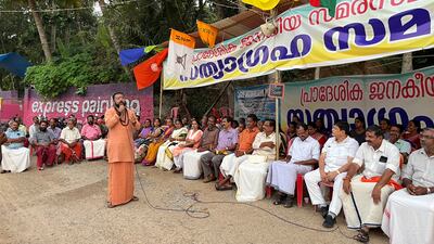 A Hindu priest addresses people who gathered to support the construction of the proposed Vizhinjam Port in the southern state of Kerala, India. Reuters