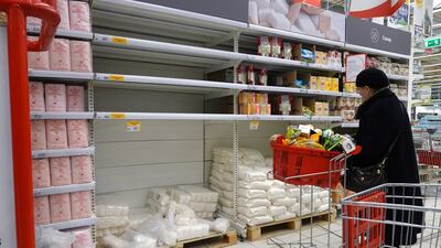 People shopping in Moscow, Russia, as the country is likely to tumble into deep recession. EPA