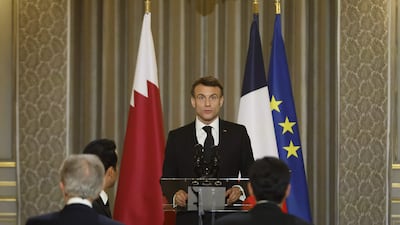 Mr Macron delivers his speech before the dinner. AFP