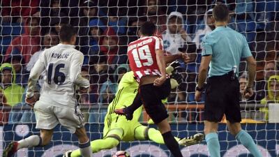 Athletic Bilbao’s Sabin Merino, third left, shoots to score the equaliser. Curto de la Torre / AFP