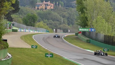 The F1 cars race at the Emilia Romagna Grand Prix at Imola in 2021. Reuters