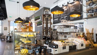 Tall towers at Café 302 contain Kyoto coffee, made by slowly dripping water through grounds and chilling it. Christopher Pike / The National