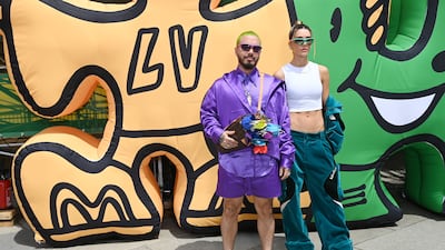Colombian singer J Balvin and Argentine model Valentina Ferrer attend the Louis Vuitton show. Getty Images For Louis Vuitton