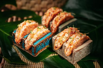 A specially curated menu includes lobster tacos and black cod. Photo: Sushisamba