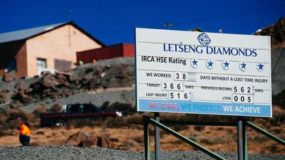 A sign showing health and safety information sits on display at the Letseng diamond mine, operated by Gem Diamonds, in Letseng, Lesotho. Its average value of $2,299 per carat is the highest in the industry, according to Gem Diamonds’ earnings released in March. Waldo Swiegers / Bloomberg