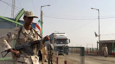 Iranian soldiers keep watch at a patrol post in the south-east of the country. AFP