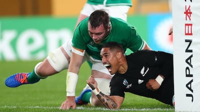 New Zealand's Aaron Smith celebrates his first try against Ireland on Saturday.Getty