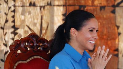 Meghan, Duchess of Sussex, smiles at the unveiling of the Queen's Commonwealth Canopy, in Tupou College in Toloa, Tongatapu island. Reuters