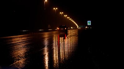 Wet roads in Dubai in the aftermath of heavy rain. Satish Kumar / The National