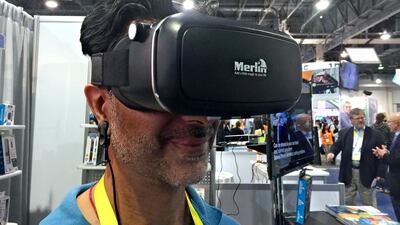 Sharad Bachani from Merlin Digital, shows off his VR headset. Photo courtesy Peter Nowak