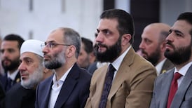 Syria's President Ahmad Al Shara, second right, attends early morning prayers for Eid Al Fitr, marking the end of Ramadan, in Damascus. AFP