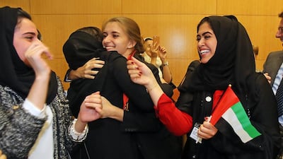 Emirati women celebrate after Dubai was selected to host the 2020 World Expo, at the OECD in Paris, Wednesday Nov. 27, 2013. Dubai will host the 2020 World Expo, becoming the first Middle Eastern city to organize the event in its more than 150-year history. (AP Photo/Remy de la Mauviniere)