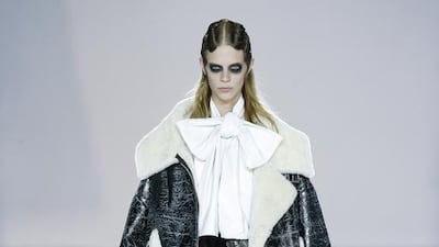 An oversized flight jacket, so large it reaches to the model’s knees. Marc Jacobs autumn/winter 2016/17. Courtesy Marc Jacobs