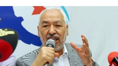 Rached Ghannouchi announces Ennahda's departure from the political reform commission yesterday in Tunis. Fethi Belaid / AFP