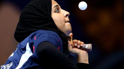 Majd Al Balooshi of UAE in action against Manika Batra of India during Day 1 of the 2016 Table Tennis Asian Cup at Dubai World Trade Centre on April 28, 2016 in Dubai. (Photo by Warren Little/Getty Images)