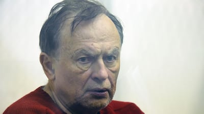 Russian historian Oleg Sokolov attends a court hearing in Saint Petersburg during his trial for murdering and dismembering his former student and lover. AFP