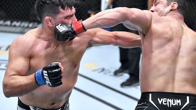 Robert Whittaker and Kelvin Gastelum trade punches in a middleweight fight during the UFC Fight Night event at UFC APEX in Las Vegas, Nevada. Chris Unger/Zuffa LLC