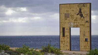 A view of the 'Door of Europe' by Italian artist Mimmo Paladino, a monument dedicated to migrants in Lampedusa island, Sicily, southern Italy. Italy rescued 22 survivors after a boat carrying about 50 migrants overturned on Sunday night. EPA
