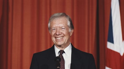 Former US President Jimmy Carter holds a press conference at the embassy in 1986. Getty Images