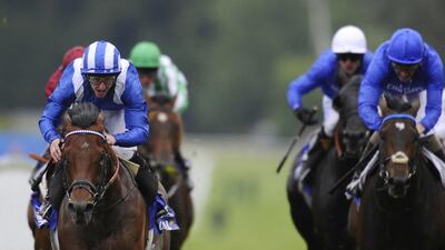 Jockey Paul Hanagan rides Mukhadram, left, to a win in the Coral Eclipse at Sandown Racecourse earlier this month. Mukhadram will be one of two Shadwell Racing runners in the gates for the King George VI and Queen Elizabeth Stakes on Saturday night. Alan Crowhurst / Getty Images