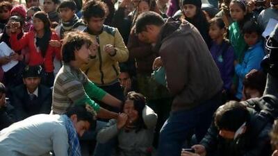 Outcry over sexual assault has swept to other countries, with Nepalese activists protesting in Kathmandu over the alleged rape and robbery of a maid by government officials.