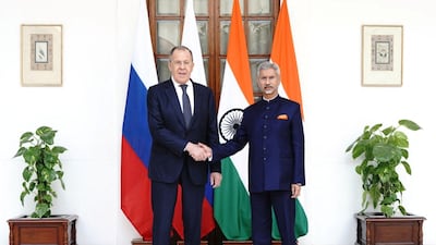Russia's Foreign Minister Sergei Lavrov and India's Foreign Minister Subrahmanyam Jaishankar shake hands during their bilateral meeting on the sidelines of G20 foreign ministers' meeting, in New Delhi, India, March 1, 2023. India's Ministry of External Affairs/Handout via REUTERS THIS IMAGE HAS BEEN SUPPLIED BY A THIRD PARTY. NO RESALES. NO ARCHIVES. MANDATORY CREDIT