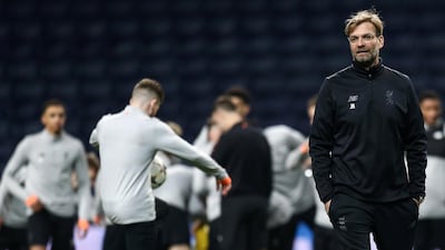 Liverpool manager Jurgen Klopp, right, has given his team a clear target. Manuel Araujo / EPA