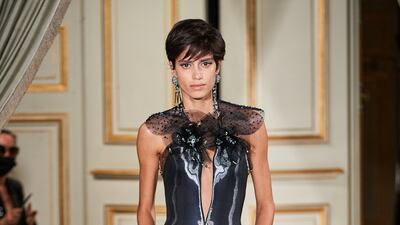 Using fluid, metallic fabric, the Armani Prive haute couture collection danced with light.