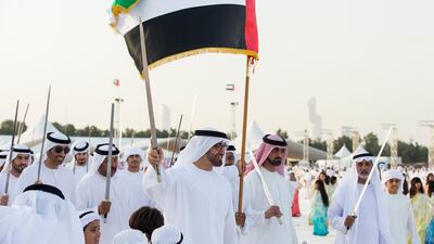 Gen Sheikh Mohamed bin Zayed Al Nahyan Crown Prince of Abu Dhabi Deputy Supreme Commander of the UAE Armed Forces (C), dances during his son's wedding reception. Ryan Carter / Crown Prince Court - Abu Dhabi