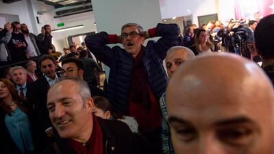 Supporters of the main opposition Republican People's Party (CHP) cheer during a press conference Istanbul, Turkey, on April 1, 2019. AFP
