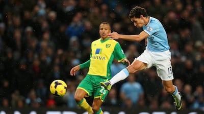 Jesus Navas of Manchester City shoots at the Norwich goal in a game they won 7-0. Alex Livesey / Getty Images