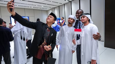 Kalima Reading Club sets a world record at Zayed National Museum on September 21. Victor Besa / The National