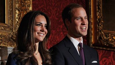 William and Kate pose for photographers to mark their 2010 engagement. AFP