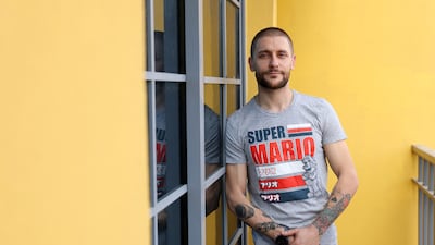 Tommaso Li Vigni splits his time between working as general manager of a Dubai restaurant and running his car workshop in Ajman. Chris Whiteoak / The National