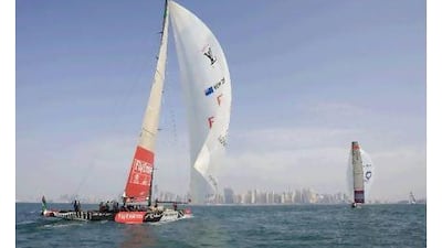 Emirates Team New Zealand practices in an Americas Cup Class boat off the coast of Dubai.