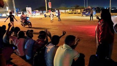 Civilians gather near the area where gunmen opened fire outside buildings used by Sudan's National Intelligence and Security Service (NISS) in Khartoum, Sudan January 14, 2020. Reuters