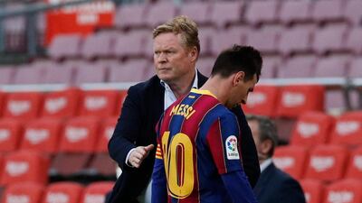 Barcelona's Lionel Messi and coach Ronald Koeman after the Celta Vigo defeat. Reuters