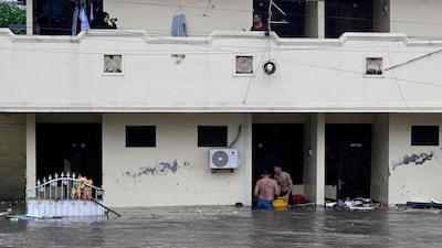 Torrential rain since late on Tuesday triggered floods and landslides in seven districts. AFP
