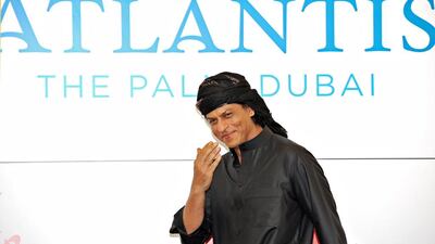 Shah Rukh Khan arrives at a news conference at the Atlantis Hotel on The Palm Jumeeriah in Dubai on September 12, 2013. Jeff Topping for The National