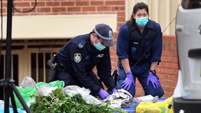 Police search for evidence at a block of flats in the Sydney suburb of Lakemba. William West.