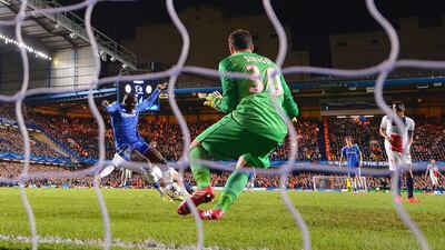 Salvatore Sirigu of Paris Saint-Germain surrenders a goal to Demba Ba of Chelsea during their Champions League quarter-final match on April 8 at Stamford Bridge. Chelsea advanced. Mike Hewitt / Getty Images