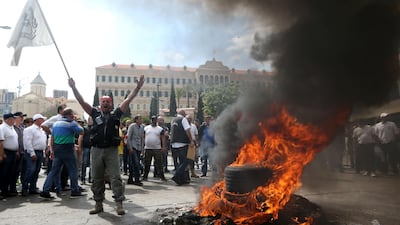 Lebanese former soldiers protest near the government headquarters in Beirut on May 10, 2019. Reuters