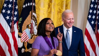 Actress Mindy Kaling receives the 2021 National Medal of Arts from US President Joe Biden during a ceremony in the East Room of the White House in Washington, DC, US, on Tuesday, March 21, 2023. President Biden is bestowing 12 honorees with the 2021 National Medal of Arts and another 11 with the 2021 National Humanities Medal. Photographer: Al Drago / Bloomberg