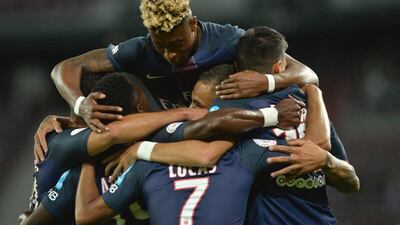 Paris Saint-Germain players celebrate a goal during their French Champions Trophy on Saturday against Lyon. Samuel Kubani / AFP / August 6, 2016
