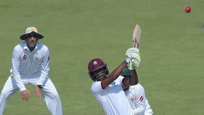 West Indies' batsman Kraigg Brathwaite hits a boundary on the second day of the third and final Test against Pakistan on Monday in Sharjah. Aamir Qureshi / AFP / October 31, 2016
