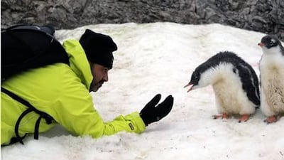 Etihad Airways employee Ali al Shamsi makes friends with the locals.